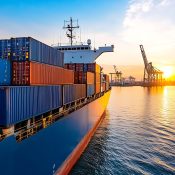 vecteezy_cargo-ship-loaded-with-colorful-containers-docked-at-busy_55214306